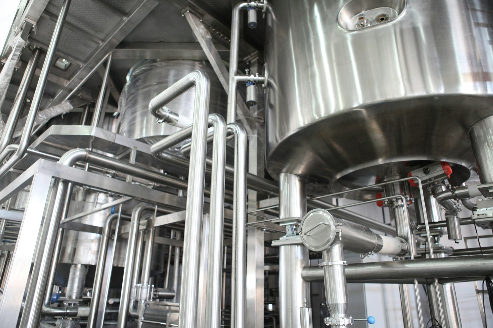 Stainless steel process vessels and pipework in a treatment installation